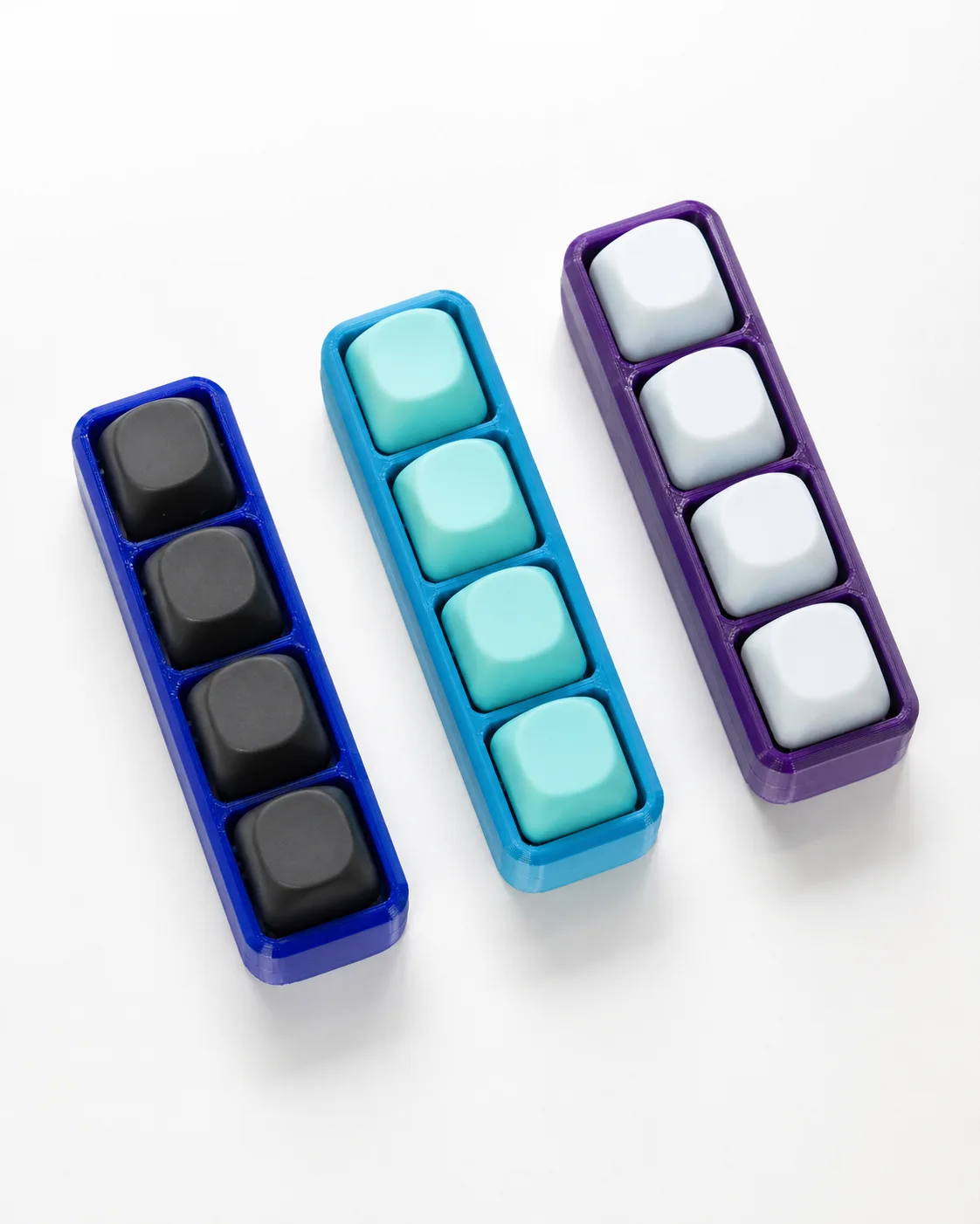 Kolme Klikki-värivaihtoehtoa pystyasennossa